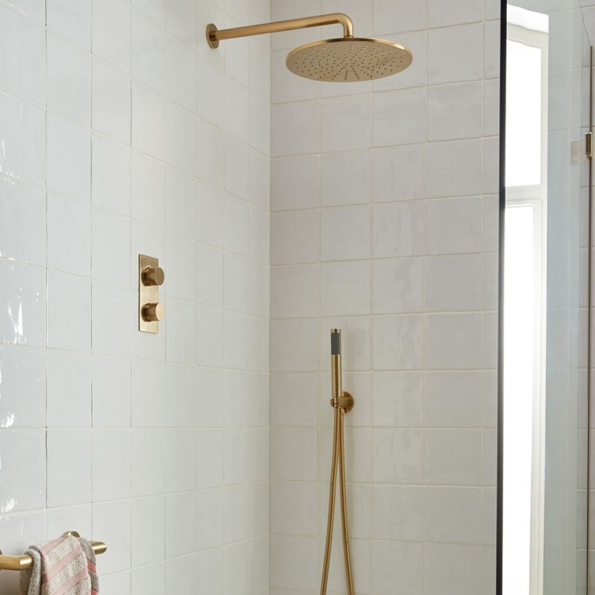 Lifestyle image of Vado Individual Brushed Gold Dual Outlet Shower Set